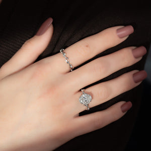 The Halo Twig Set With A 1.5 Carat Oval Lab Diamond