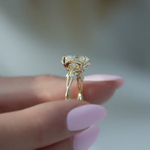 The Halo Twig Set With A 1 Carat Oval Lab Diamond