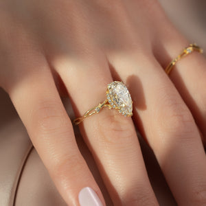 The Halo Twig Set With A 1 Carat Pear Lab Diamond