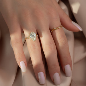 The Halo Twig Set With A 1 Carat Pear Lab Diamond