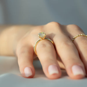 The Pave Sarah Set With A 1.5 Carat Emerald Moissanite