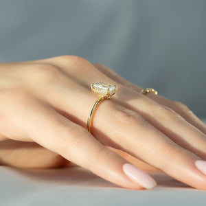 The Pave Sarah Set With A 1.5 Carat Emerald Moissanite