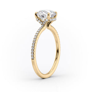 The Pave Margot Set With A 4.5 Carat Emerald Moissanite