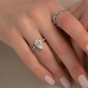The Daisy Set With A 1.5 Carat Pear Lab Diamond