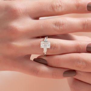 The Three Stone Twig Set With A Emerald Moissanite