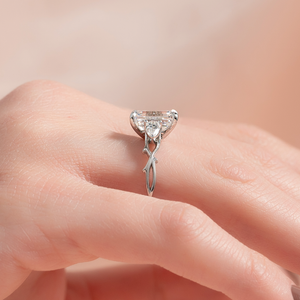 The Three Stone Twig Set With A Emerald Moissanite