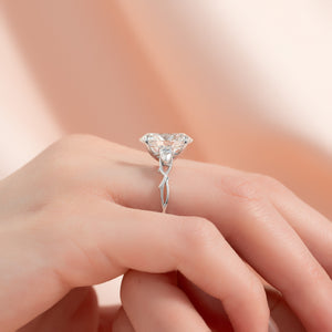 The Three Stone Twig Set With A 1.5 Carat Oval Lab Diamond