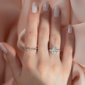 The Three Stone Twig Set With A Pear Moissanite