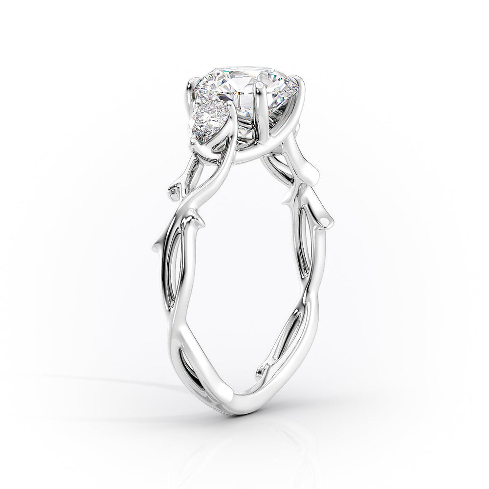 The Three Stone Twig Set With A 2.5 Carat Radiant Moissanite