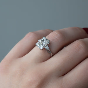 The Three Stone Twig Set With A 1.5 Carat Radiant Lab Diamond