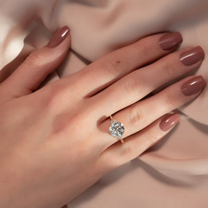 The Hearts Liv Set With A 2.5 Carat Round Moissanite