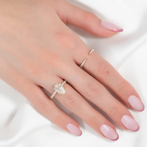 The Pave Lisa Set With A 1 Carat Pear Lab Diamond