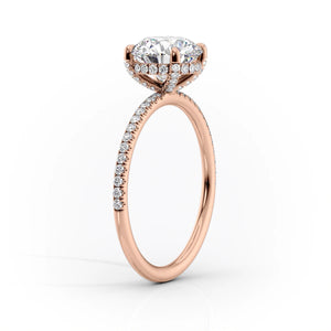 The Pave Crown Kamellie Set With A 4.5 Carat Elongated Cushion Moissanite
