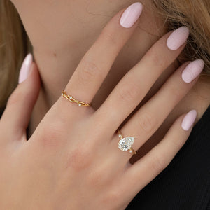 The Twig Set With A 4.5 Carat Pear Moissanite