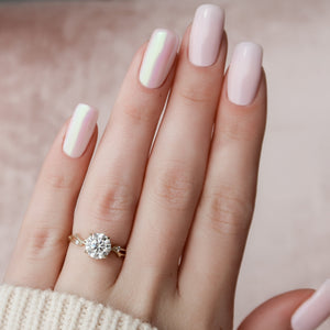 The Twig Set With A 2.5 Carat Round Moissanite