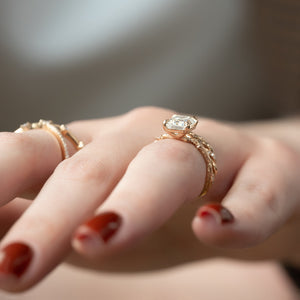 The Textured Twig Set With A 1.5 Carat Emerald Lab Diamond