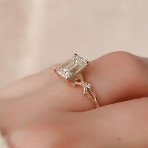 The Textured Twig Set With A Emerald Moissanite