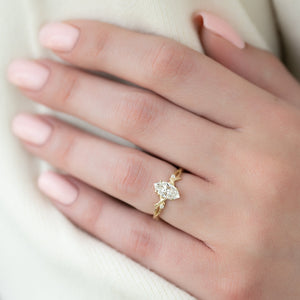 The Textured Twig Set With A 1.5 Carat Marquise Lab Diamond