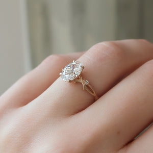 The Textured Twig Set With A 1 Carat Oval Lab Diamond