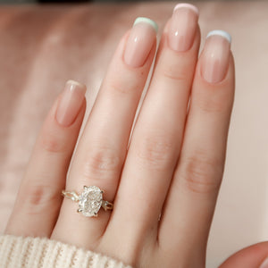 The Textured Twig Set With A 2 Carat Oval Lab Diamond