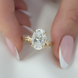 The Textured Twig Set With A 2 Carat Oval Lab Diamond