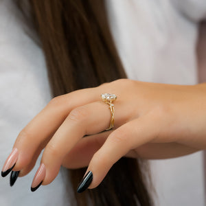 The Textured Twig Set With A Oval Moissanite