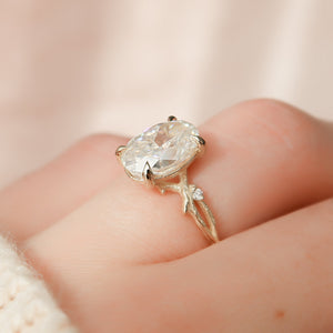 The Textured Twig Set With A Oval Moissanite