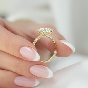 The Textured Twig Set With A 2 Carat Oval Lab Diamond