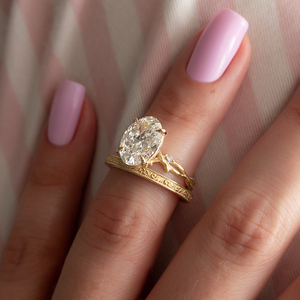 The Textured Twig Set With A Oval Moissanite