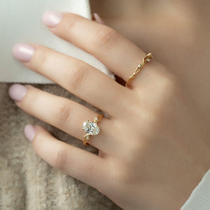 The Textured Twig Set With A 2 Carat Oval Lab Diamond