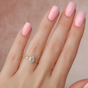 The Textured Twig Set With A 2 Carat Oval Lab Diamond