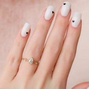 The Textured Twig Set With A 1.5 Carat Pear Lab Diamond