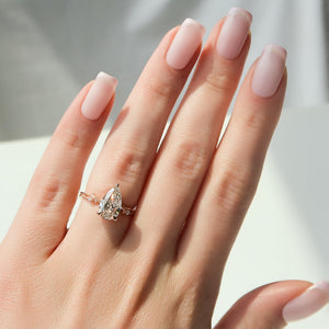 The Textured Twig Set With A 1.5 Carat Pear Lab Diamond
