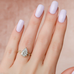 The Textured Twig Set With A 2 Carat Pear Lab Diamond
