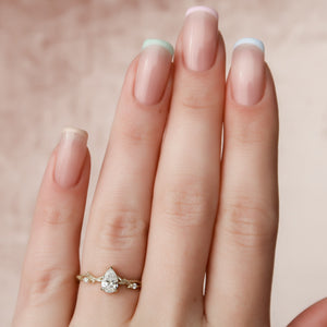 The Textured Twig Set With A 2 Carat Pear Lab Diamond