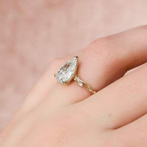 The Textured Twig Set With A 2 Carat Pear Lab Diamond