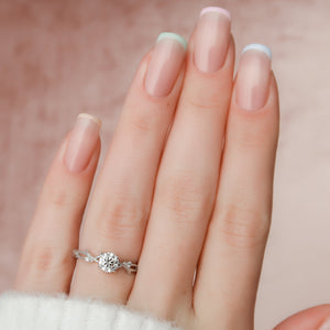 The Textured Twig Set With A Round Moissanite