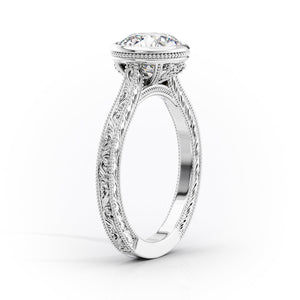 The Bezel Sierra Set With A 2 Carat Emerald Moissanite