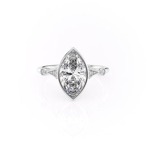 The Bezel Amber Set With A 1.5 Carat Marquise Moissanite
