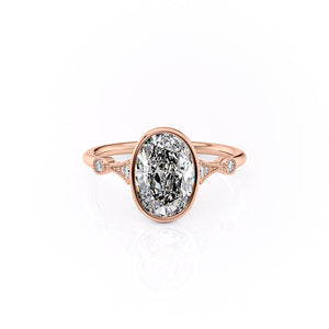 The Bezel Amber Set With A 1 Carat Oval Moissanite