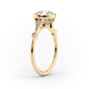 The Bezel Amber Set With A 1.5 Carat Pear Moissanite