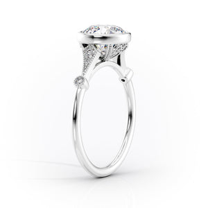 The Bezel Amber Set With A 1 Carat Round Moissanite
