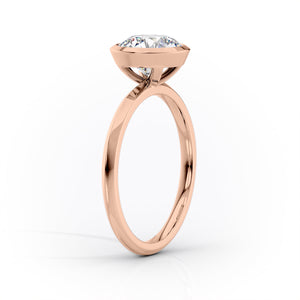 The Razor Bezel Kamellie Set With A 3 Carat Elongated Cushion Moissanite