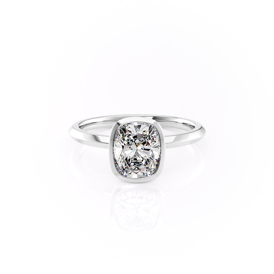 The Razor Bezel Kamellie Set With A 1 Carat Elongated Cushion Moissanite