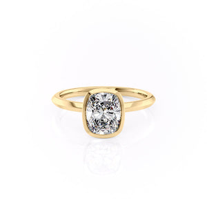 The Razor Bezel Kamellie Set With A Elongated Cushion Moissanite