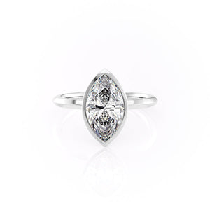 The Razor Bezel Kamellie Set With A 1.5 Carat Marquise Moissanite