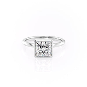 The Razor Bezel Kamellie Set With A 1.5 Carat Princess Moissanite