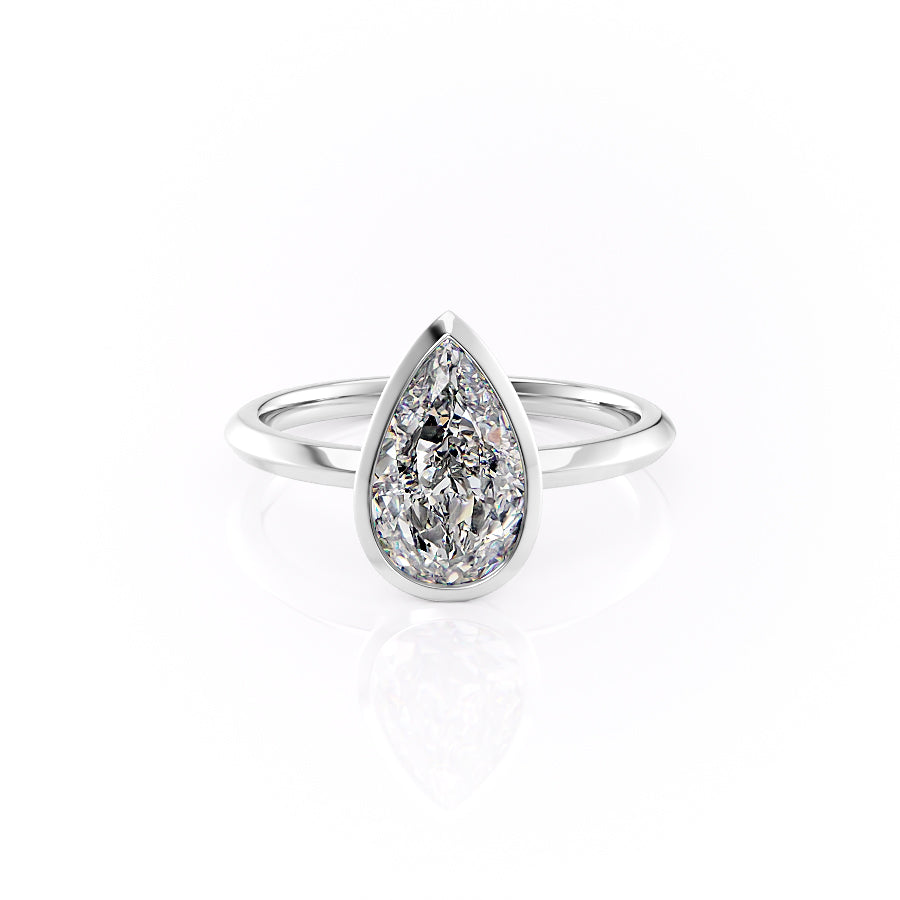 The Razor Bezel Kamellie Set With A 1.5 Carat Pear Moissanite