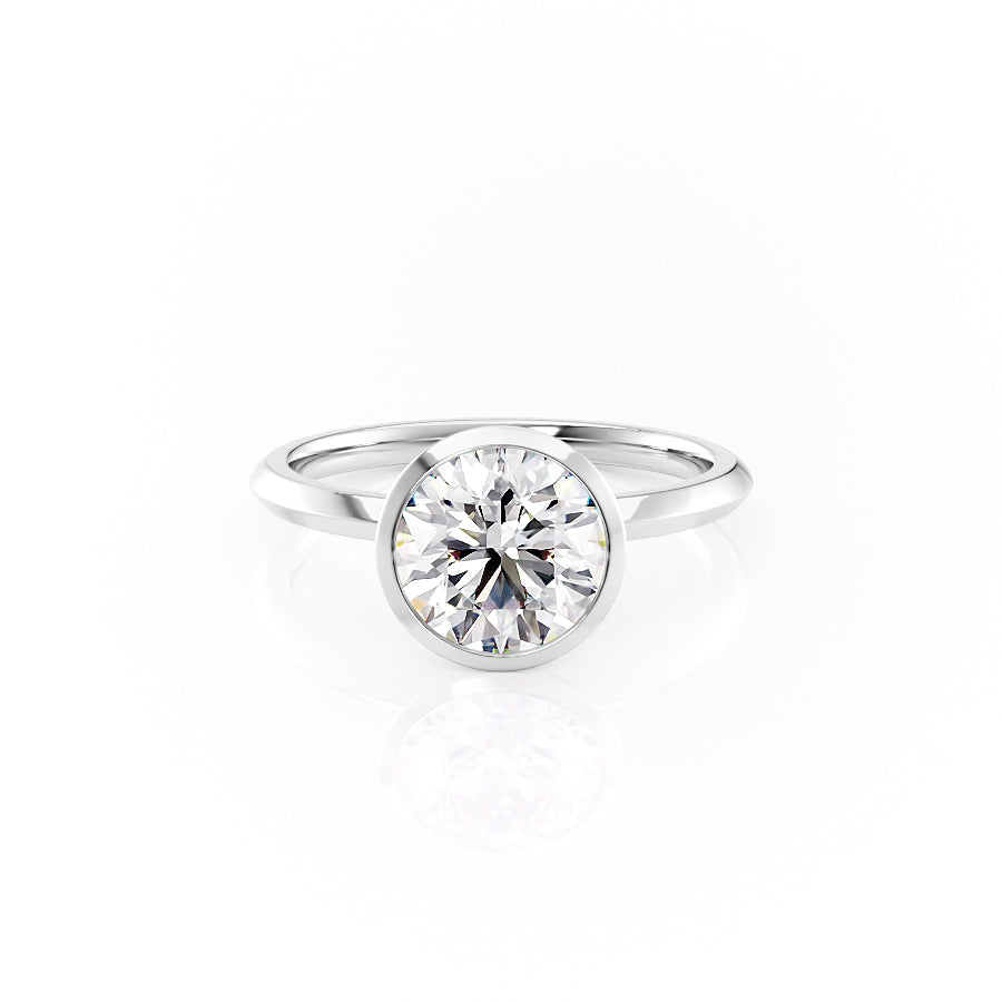 The Razor Bezel Kamellie Set With A 1.5 Carat Round Moissanite