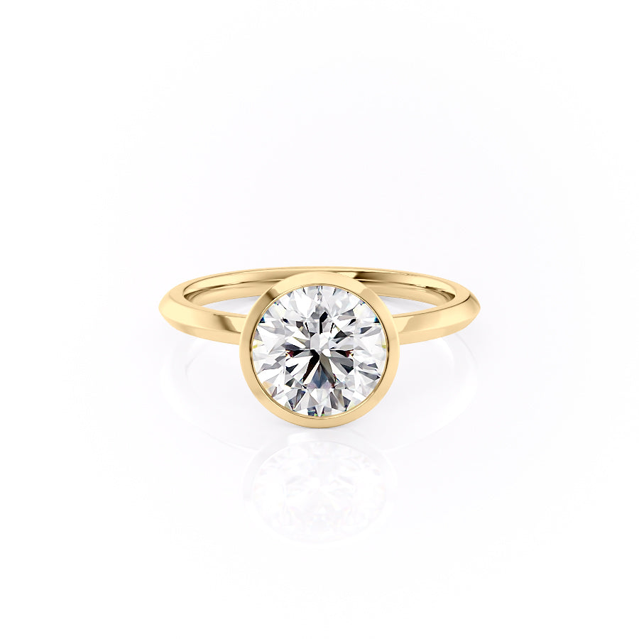 The Razor Bezel Kamellie Set With A 1.5 Carat Round Moissanite